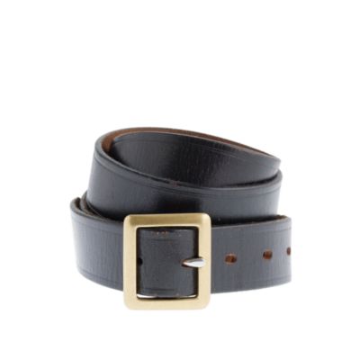 Embossed-edge belt with center bar buckle