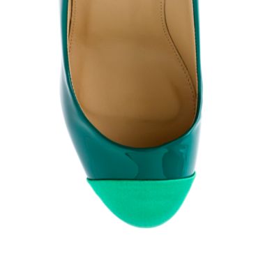 Etta cap toe patent pumps