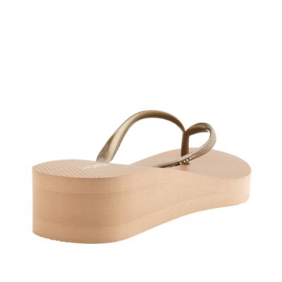 Skinny wedge flip-flops
