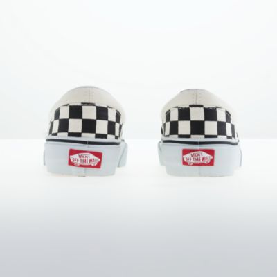 Kids' Vans&reg; checkerboard slip-ons