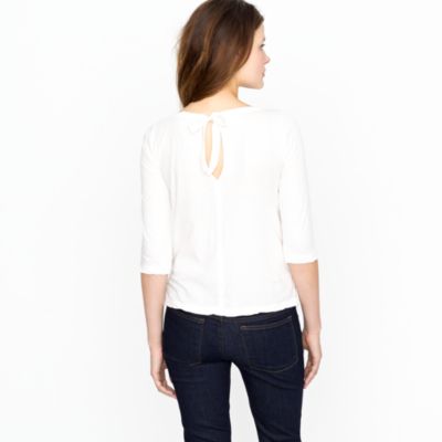 Ring-around eyelet top