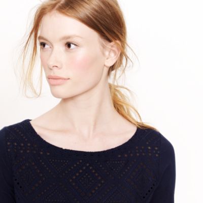 Angular eyelet top