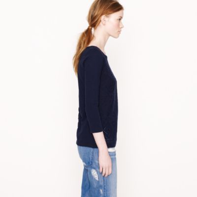 Angular eyelet top